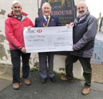 President Clive Livingstone and Rodney Reed presenting the donation to Frederick Smith